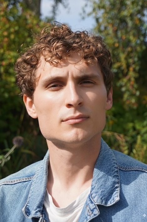 wonderful headshot of young man now with no glasses